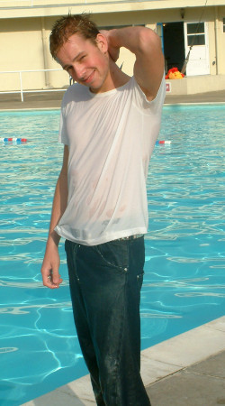 power swim training in pool with t-shirt and jeans