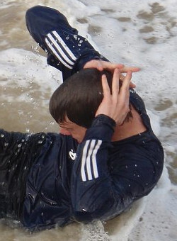 tracksuit beach surf sit-up fully clothed